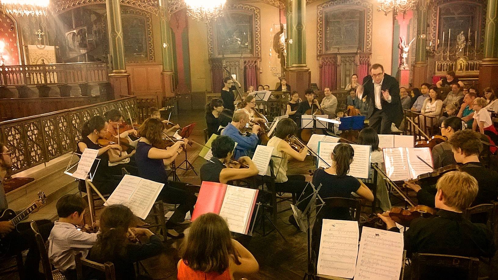 Sebastian Giacomi conducting orchestra
