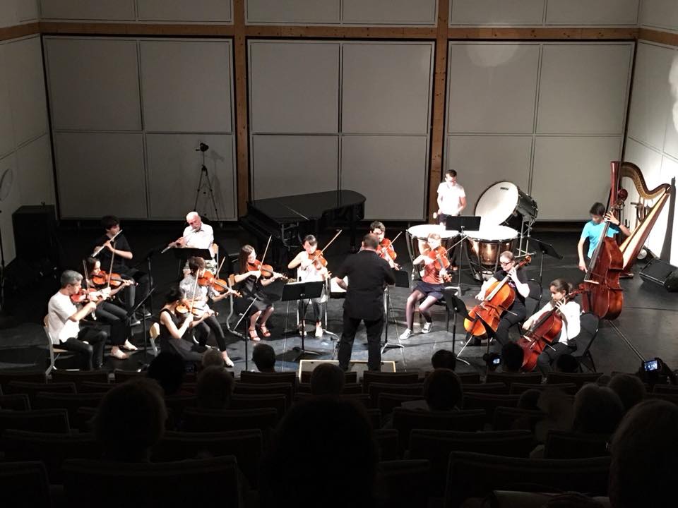 Sebastian Giacomi conducting orchestra
